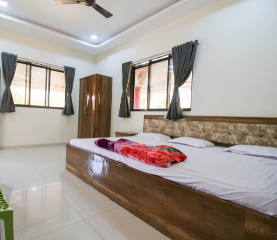 low budget Deluxe room in karjat with swimming pool